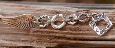 On Wings of Love Sterling Silver Bracelet by Cathy Dailey